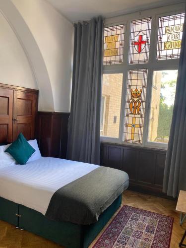 Ένα ή περισσότερα κρεβάτια σε δωμάτιο στο Endsleigh Park Hotel
