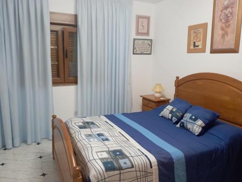 Ένα ή περισσότερα κρεβάτια σε δωμάτιο στο Casa Gaviotas, Portosín