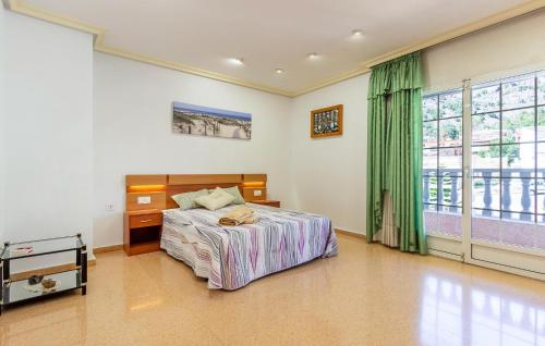 Ένα ή περισσότερα κρεβάτια σε δωμάτιο στο Amazing Apartment In Orihuela