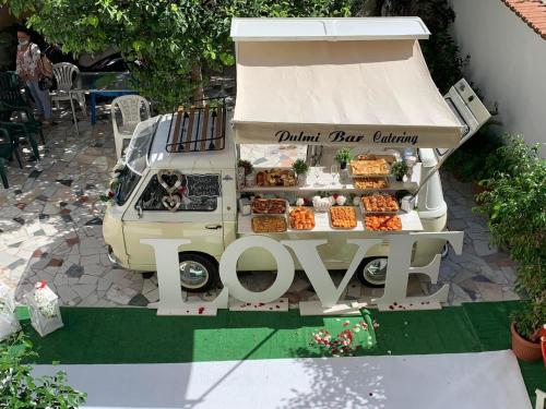 a food cart with pastries on top of it at Sosta Camper e Roulott L’Amour in Naples