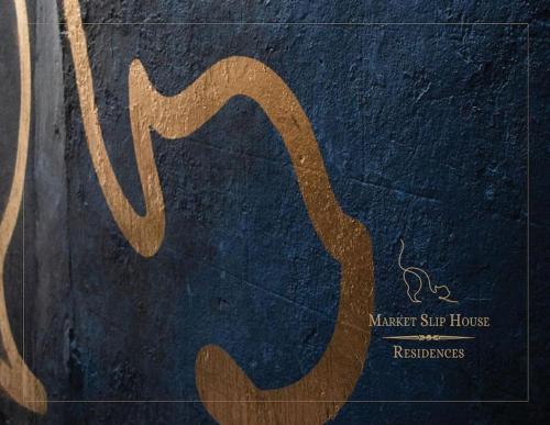 un libro con un cartel que dice Master Surf house en Market Slip House en Kilkenny
