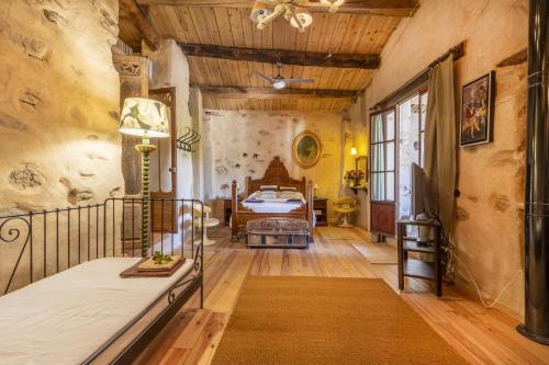 a bedroom with a bed in a room at Les Orenetes in Artesa de Segre