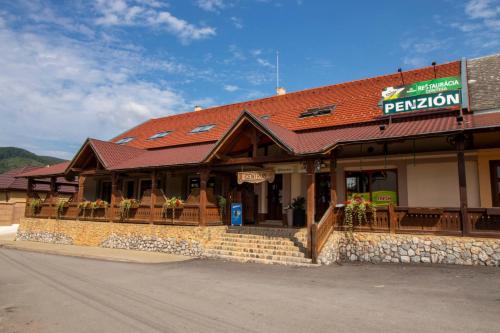 a restaurant on the side of a street at Penzión CONTESA in Rožňava
