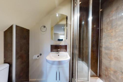 a bathroom with a sink and a shower at studio 69 in London