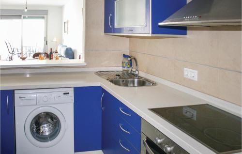 A kitchen or kitchenette at Nice Apartment In Casarones With Kitchen