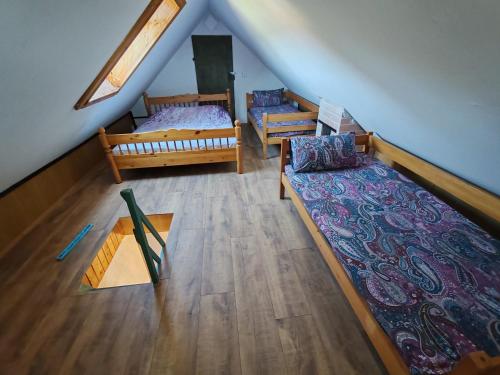 Ένα ή περισσότερα κρεβάτια σε δωμάτιο στο Apartment Ursa Major