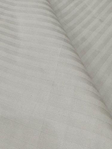 a close up of a white bedsheet at Luxury Dream Vacation Home in DHA Near Lahore Airport in Lahore