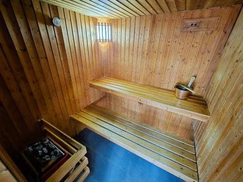 an inside of a wooden sauna with a sink at Melfort Pier & Harbour Resort in Kilmelfort