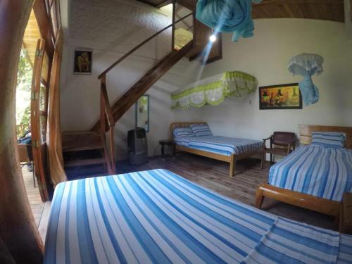 Postel nebo postele na pokoji v ubytování Bed and Breakfast Puerto López