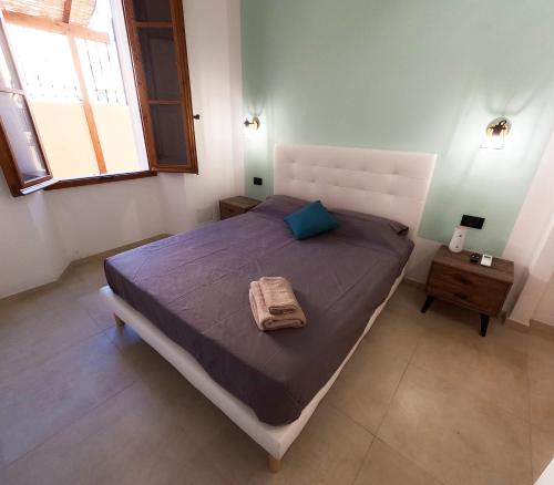 Postel nebo postele na pokoji v ubytování North Sardinia Retreats - Millelire Smart Rooms