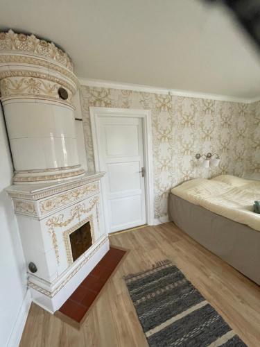 Postel nebo postele na pokoji v ubytování Ingmarsö B&B