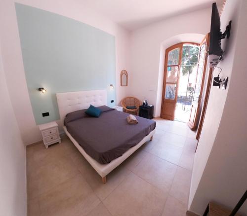 Postel nebo postele na pokoji v ubytování North Sardinia Retreats - Millelire Smart Rooms