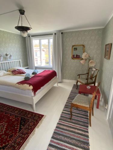 Postel nebo postele na pokoji v ubytování Ingmarsö B&B