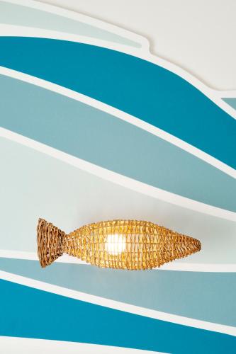 a gold fish on a blue and white background at Iberostar Waves Gaviotas Park in Morro del Jable