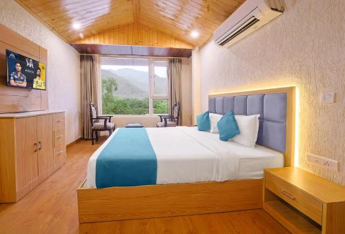 Katil atau katil-katil dalam bilik di Hotel Green - Behind Parmarth Niketan