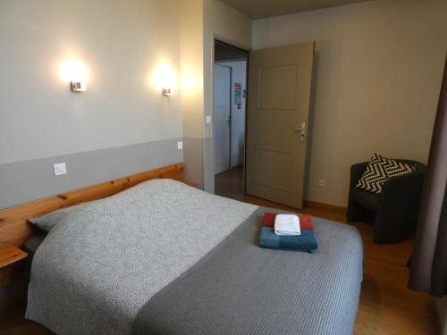 Postel nebo postele na pokoji v ubytování Gîte la loutière