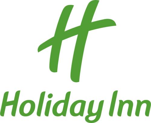 a green holiday inscription with a cross on a white background at Holiday Inn La Verkin - Zion Park by IHG in La Verkin
