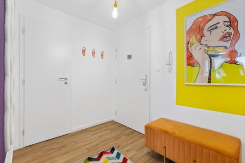 a room with white walls and a painting on the wall at LAM Pop Up - AC - VIEW - FREE PARKING in Bratislava