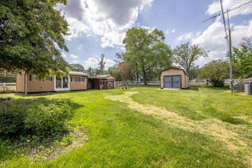 a large grassy yard in front of a building at Hobbit House, one-of-a-kind home in Bel Air