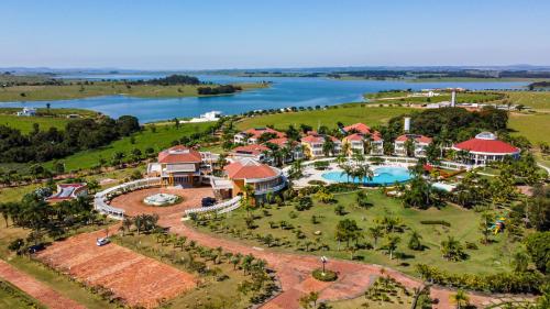 an aerial view of a resort with a lake at Daj Resort & Marina in Ribeirão Claro