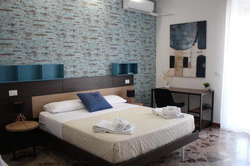 Postel nebo postele na pokoji v ubytování B&B DEGLI ANGELI