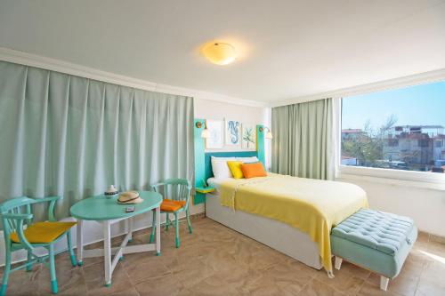 Ένα ή περισσότερα κρεβάτια σε δωμάτιο στο Kuytu Bed & Breakfast