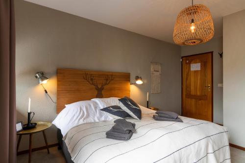Un ou plusieurs lits dans un hébergement de l'établissement B&B Bie Janssen