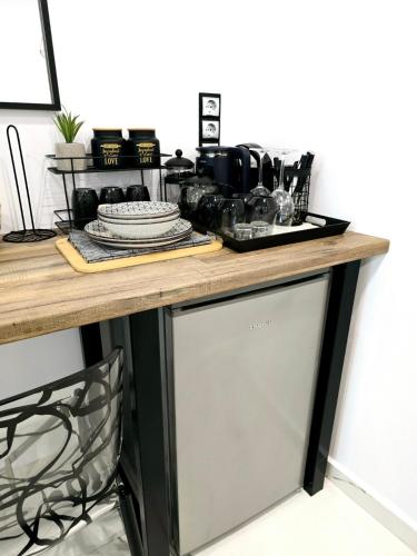 a kitchen with a counter with a dishwasher at Philoxenia Guest Studio in Himare