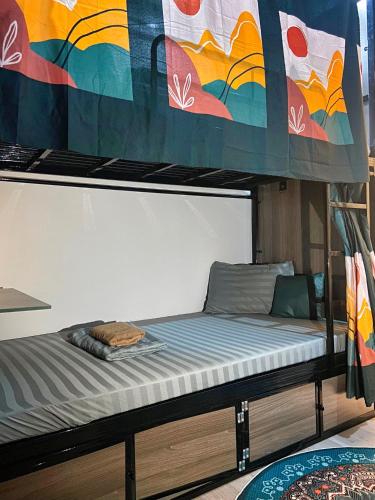 un letto sopra un letto a castello di House of Hostels ad Ho Chi Minh