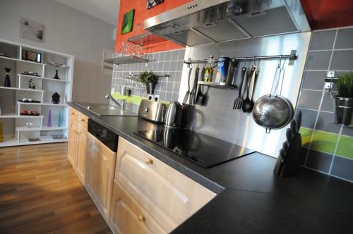 Kuchyň nebo kuchyňský kout v ubytování Appartement De Charme climatisé pour 6 à 8 pers