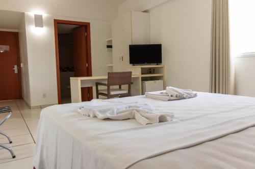 Katil atau katil-katil dalam bilik di Apartamento Le Jardin