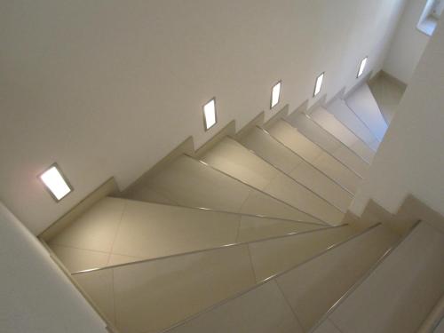 a staircase in a building with lights on it at Ferienwohnung Bergpanorama in Fulpmes