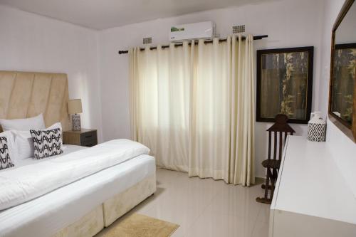 Postel nebo postele na pokoji v ubytování Epignosis Apartments