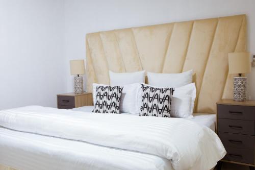 Postel nebo postele na pokoji v ubytování Epignosis Apartments