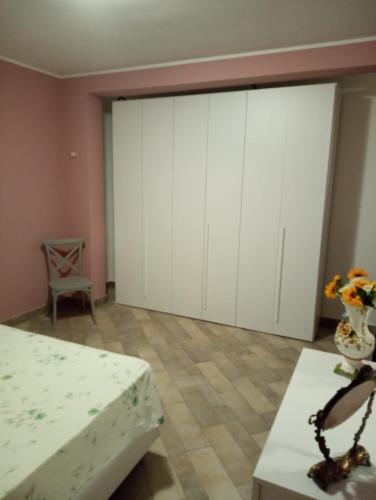 Ένα ή περισσότερα κρεβάτια σε δωμάτιο στο Stefania
