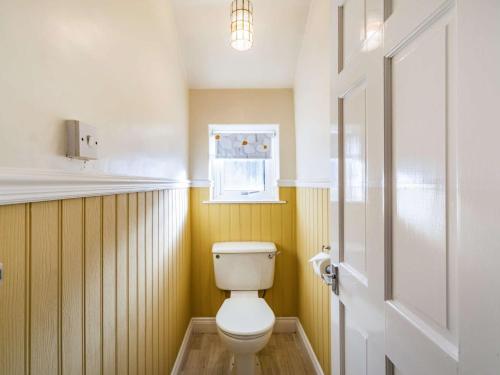 a bathroom with a white toilet in a room at 4 Bed in Keswick 86248 in Rosthwaite