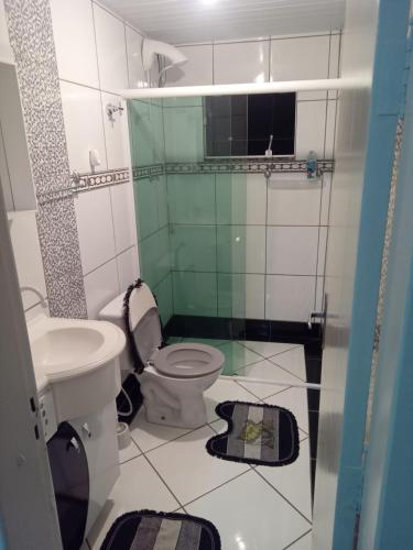 Bilik mandi di POUSADA ALTERNATIVA MANU LAGES suite