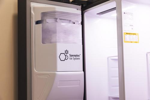 a refrigerator with a sticker on the door at Oceanview Apt Near Panama City w/ King Bed & More in Playa Bonita Village