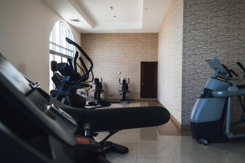 a room with a gym with exercise bikes in it at Oceanview Apt Near Panama City w/ King Bed & More in Playa Bonita Village