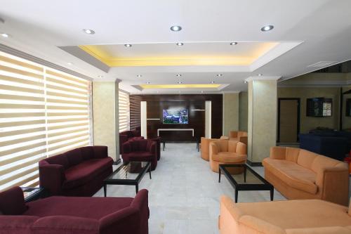 Posezení v ubytování Myra Hotel
