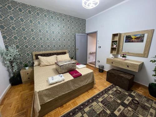 a bedroom with a bed and a living room at A luxury apartment fully nile view -Downtown Cairo in Cairo