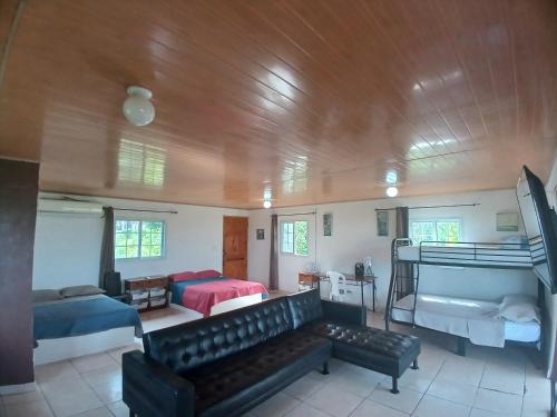 Postel nebo postele na pokoji v ubytování Hotel Cabañas Casita La Ermita