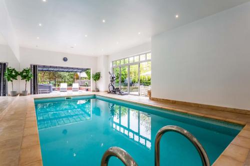 a swimming pool in a house with a house at Guest Homes - The Grove in Hartlepool