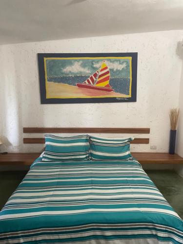 Ein Bett oder Betten in einem Zimmer der Unterkunft Hotel The Winds Of Margarita