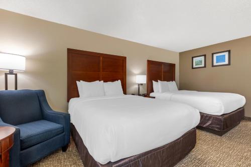 Una cama o camas en una habitación de Comfort Inn & Suites Temple - Medical Center