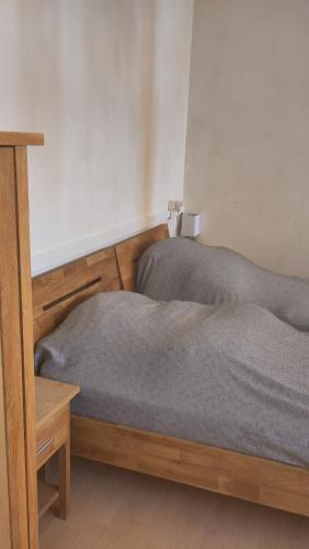 two beds sitting next to each other in a bedroom at ZUR POST - HÜLCHRATH in Grevenbroich