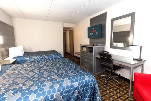 Coratel Inn & Suites by Jasper Mankatoにあるベッド