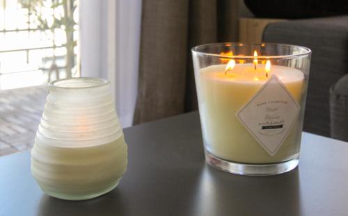 a candle sitting on top of a table at Experiencia Premium en la Esencia de Denia in Denia