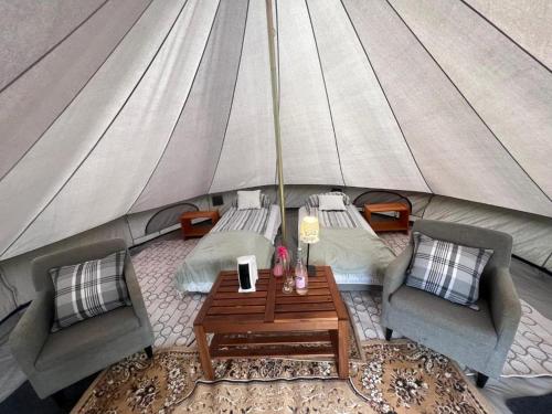an overhead view of a tent with two beds and a table at Godaland Glamping in Hvolsvöllur