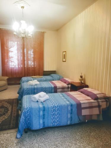 Posteľ alebo postele v izbe v ubytovaní 2 bedrooms apartement with enclosed garden at Vita